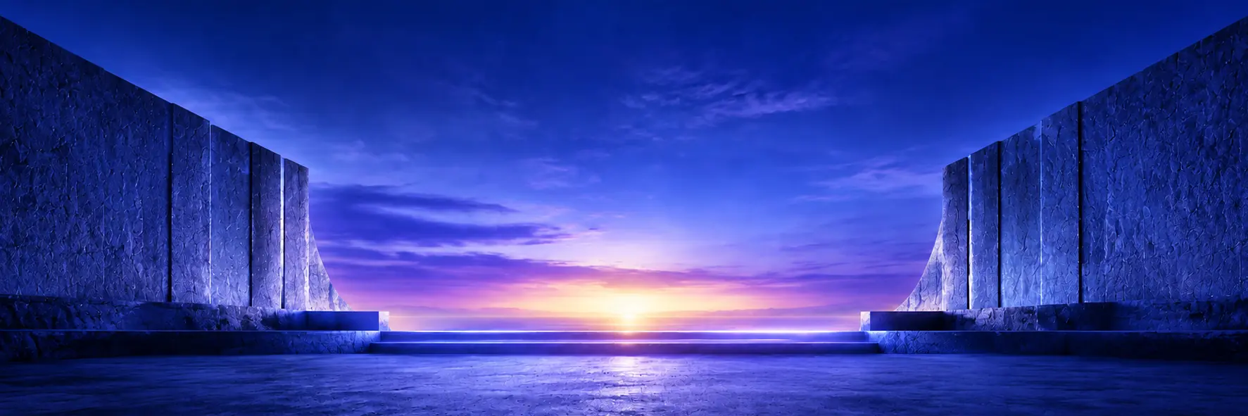 A blue horizon opening between two stone walls